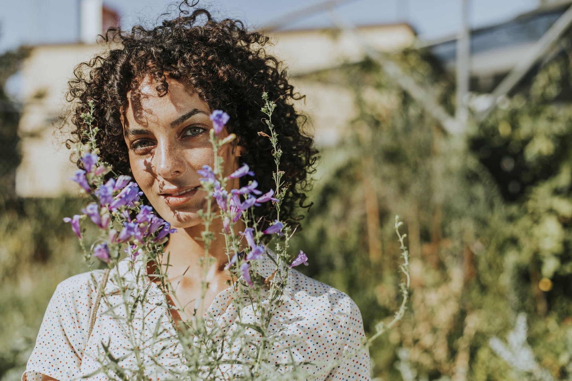 Woman buying flowers at a nursery